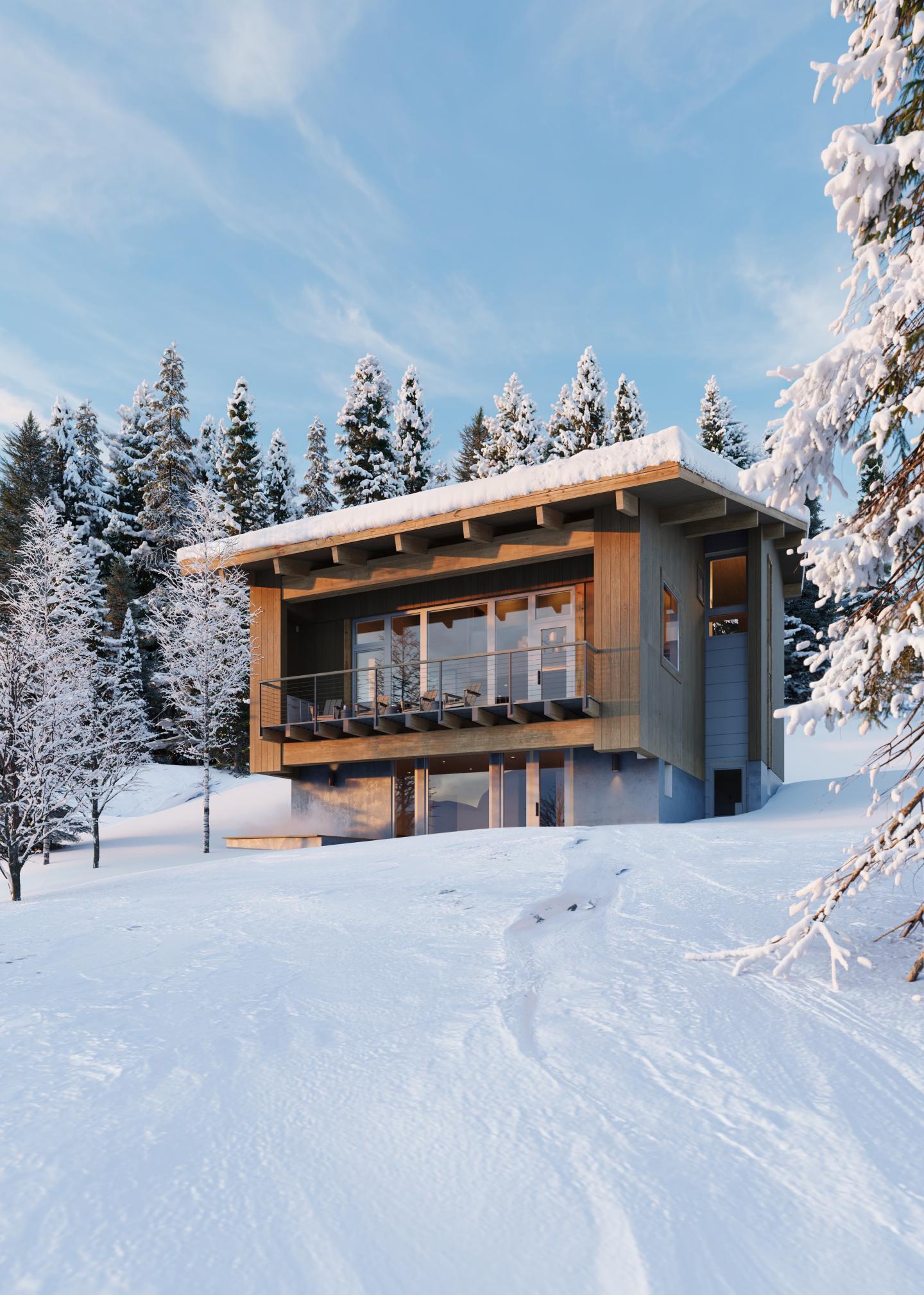Modern cabin in snowy forest with clear blue sky.