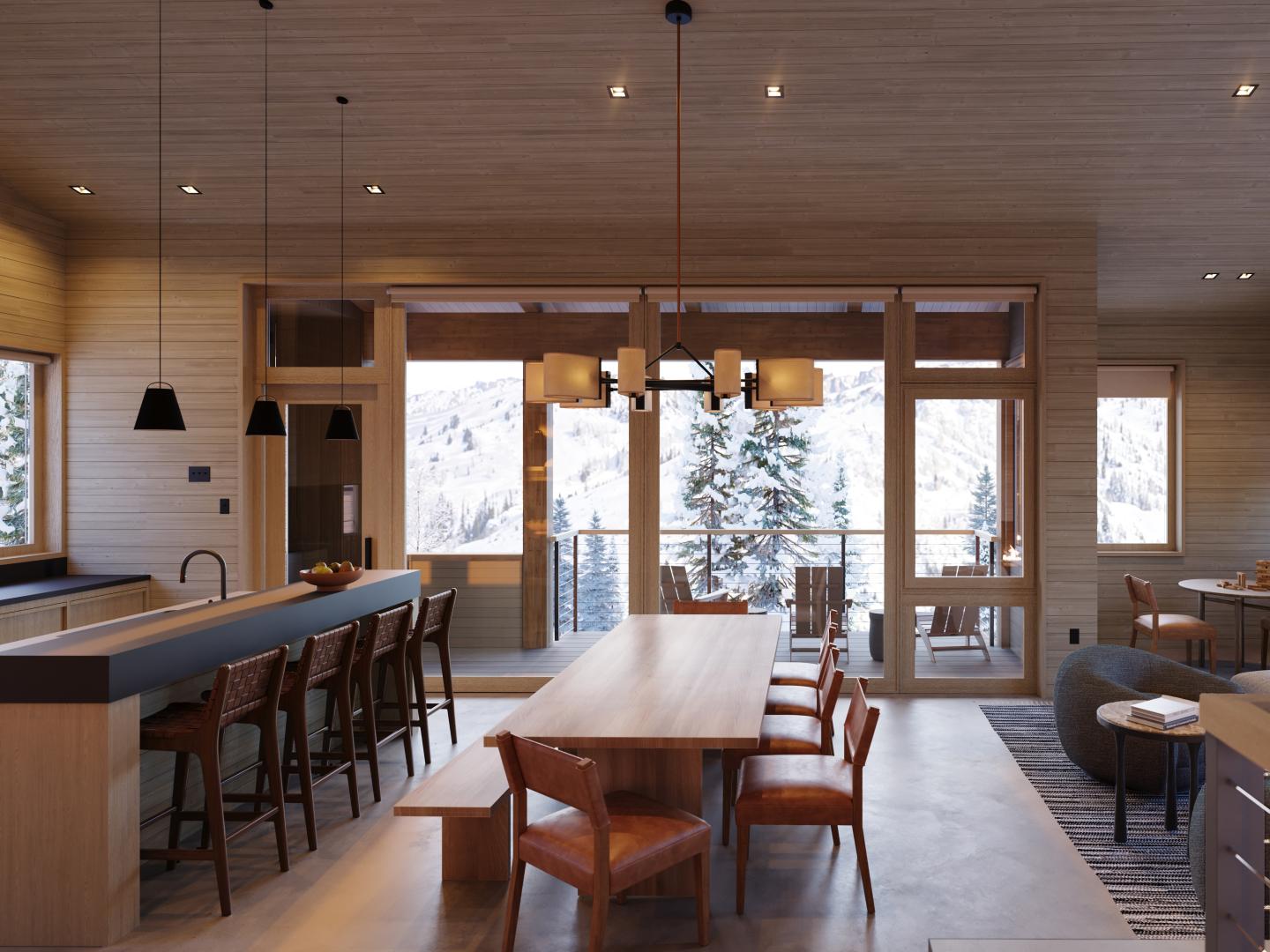 Modern dining area with wooden table, chairs, and large windows overlooking snowy trees.